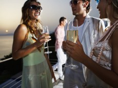 Friends Enjoying Champagne on Balcony