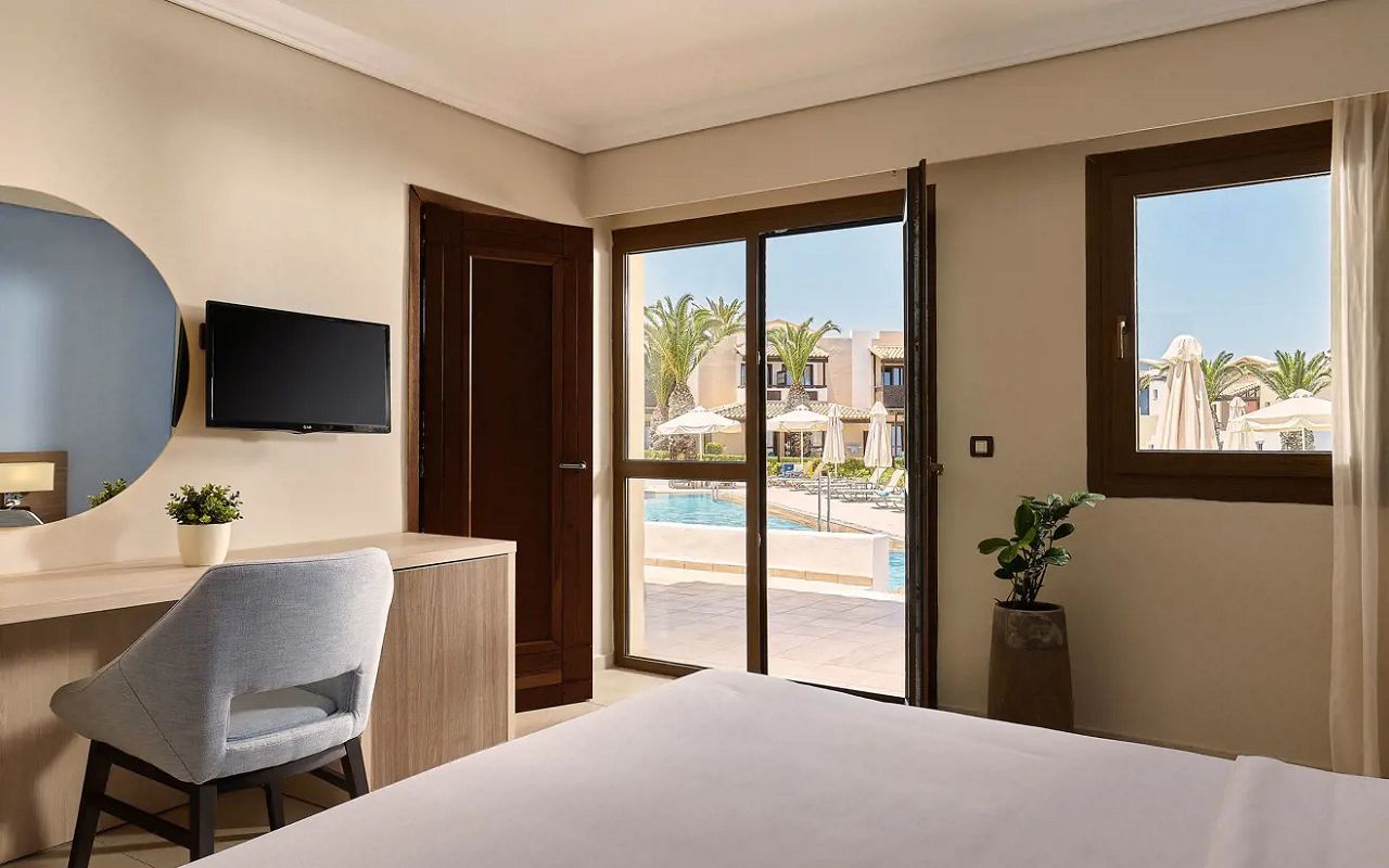 AnyConv.com__aldemar-knossos-royal-resort-hersonissos-crete-family-room-sharing-pool-0200207