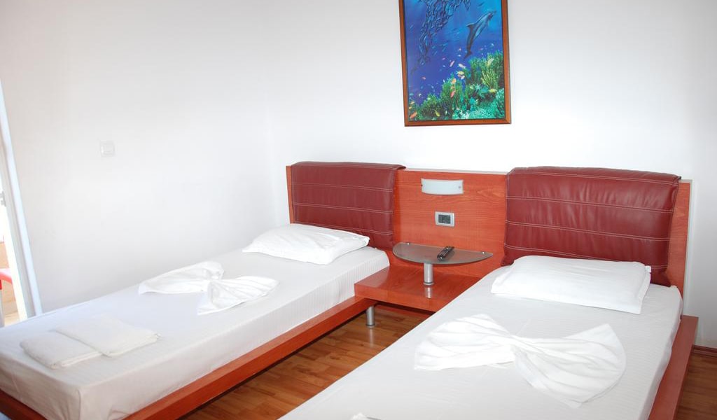 Twin Room with Sea View and Balcony-min